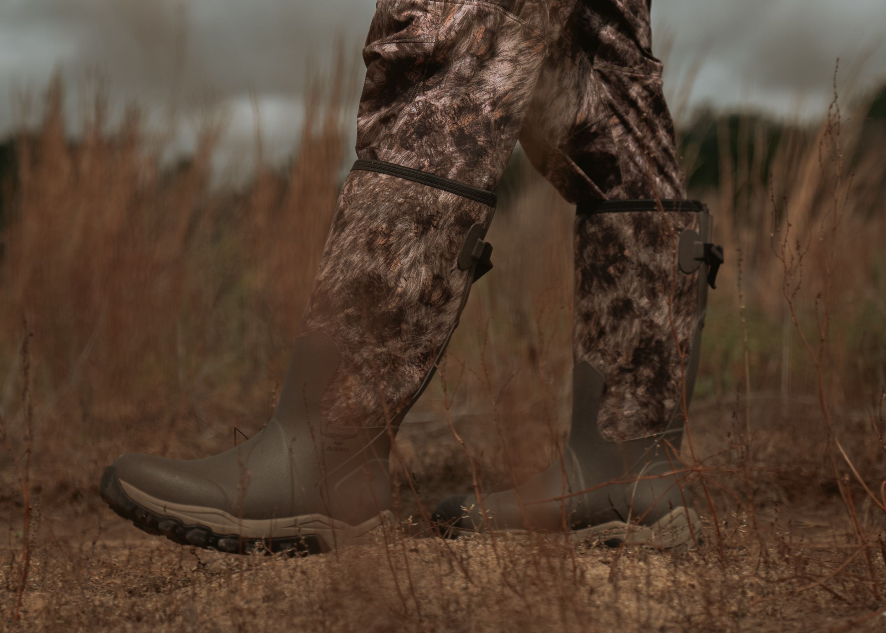 showcasing the new asio gear rapx camo boots in a western plain